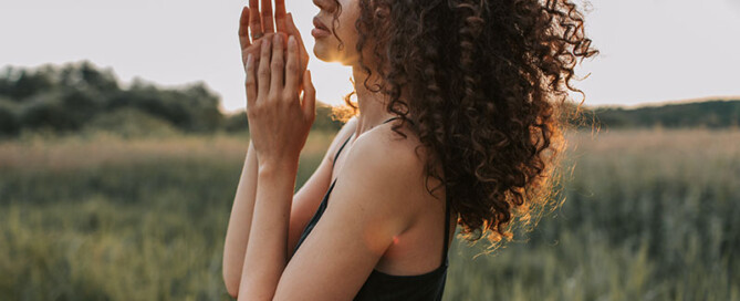 mental-health-foundation-blog-post-cannabis-helping-with-covid-anxiety-image-of-woman-at-peace-in-field