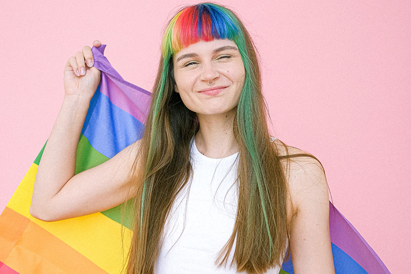 mental health foundation articles lgbtq mental health image of girl holding rainbow flag