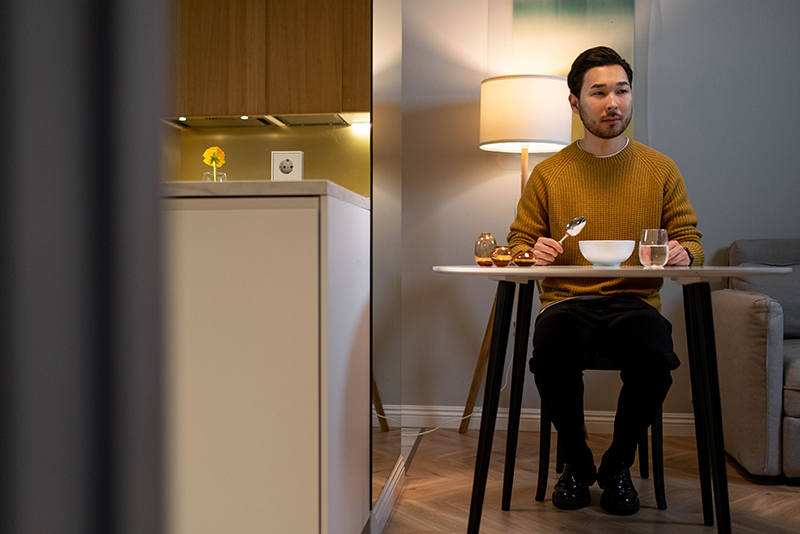 mental health foundation articles loneliness image of a man eating alone at home